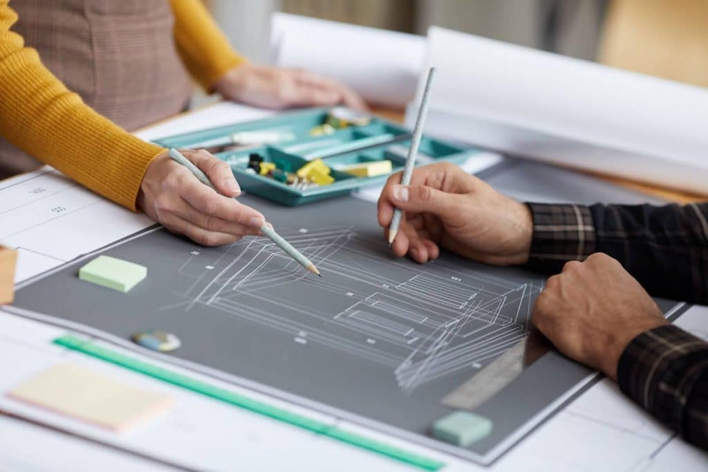 professionals discussing schematic design phase for commercial building renovation