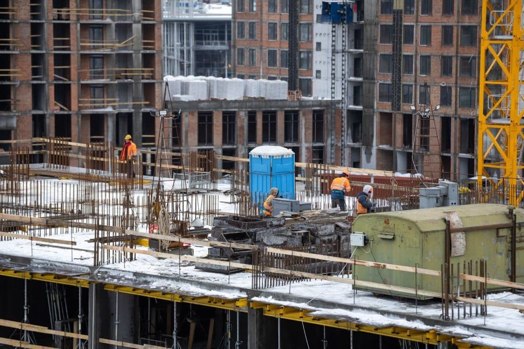 professionals curing concrete in cold weather