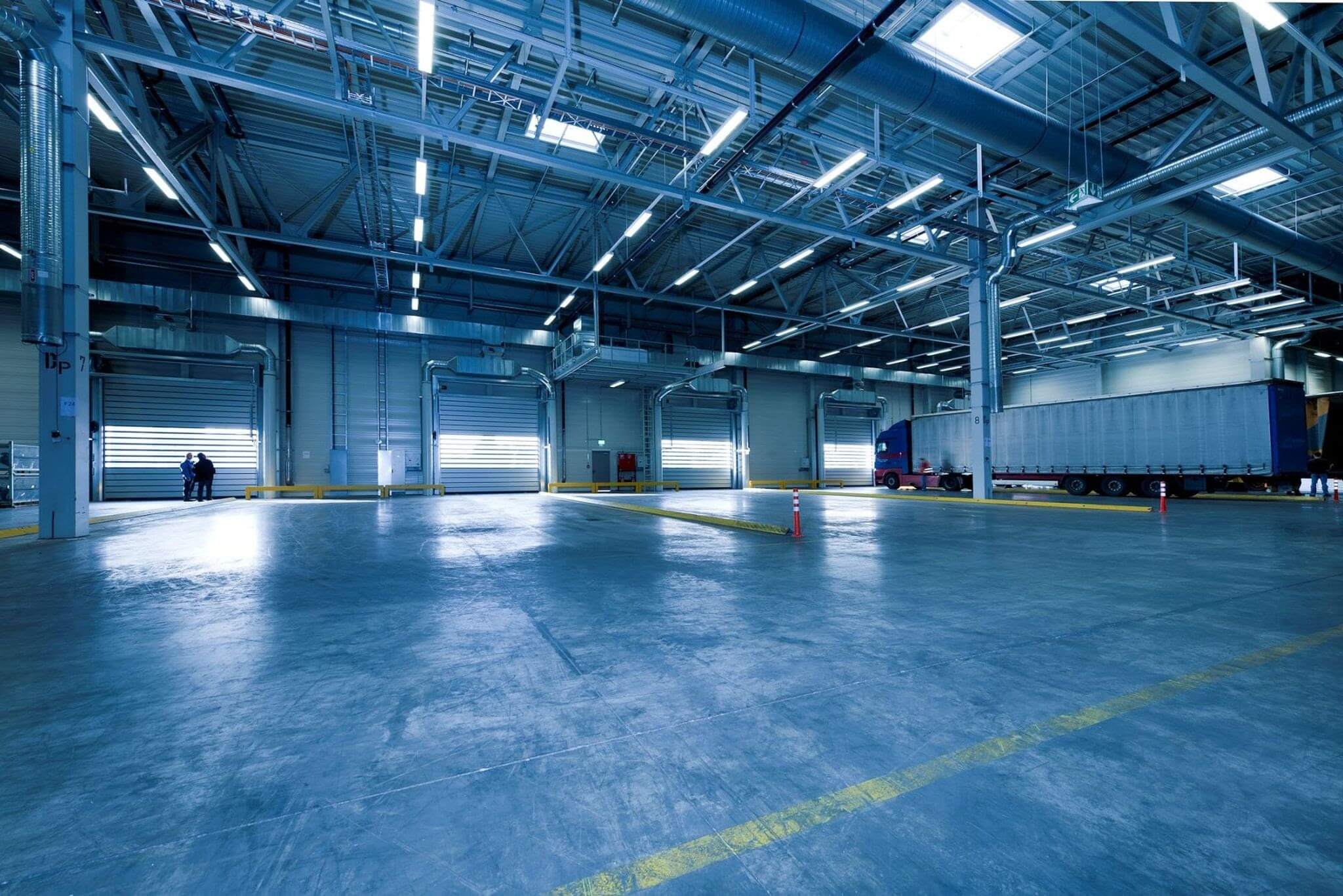Interior shot of metal building with concrete flooring