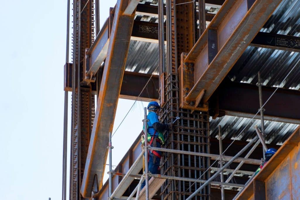 construction professional working on steel structure