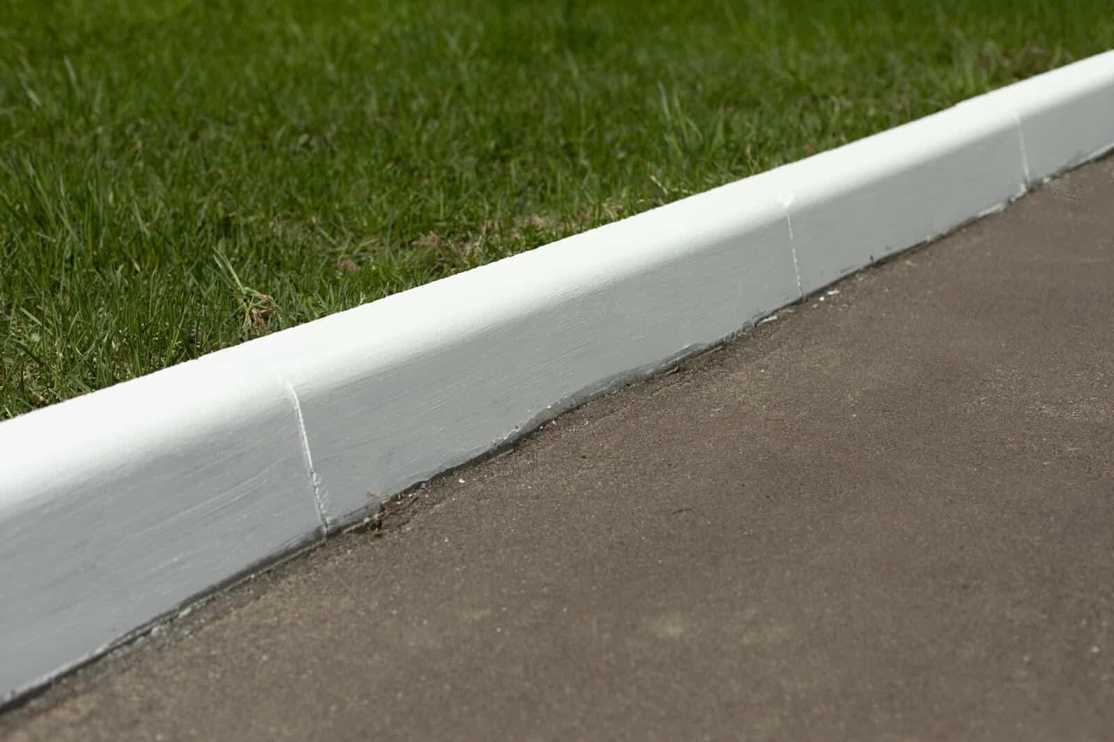 New curb and gutter with fresh coat of paint